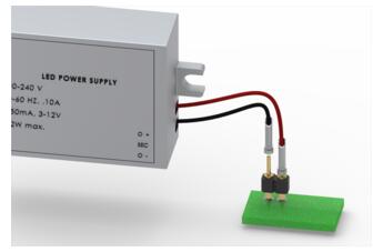 Solder-cup receptacles attached to wires and plugged onto a PCB header