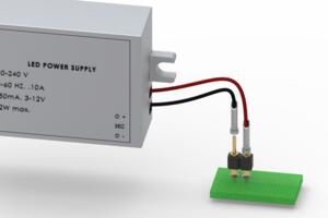 Solder-cup receptacles attached to wires and plugged onto a PCB header